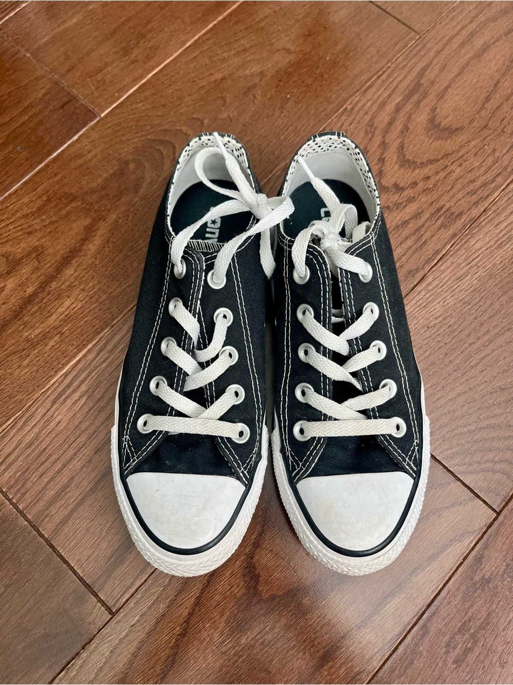 Black Low-Top Converse Sneakers with White Laces